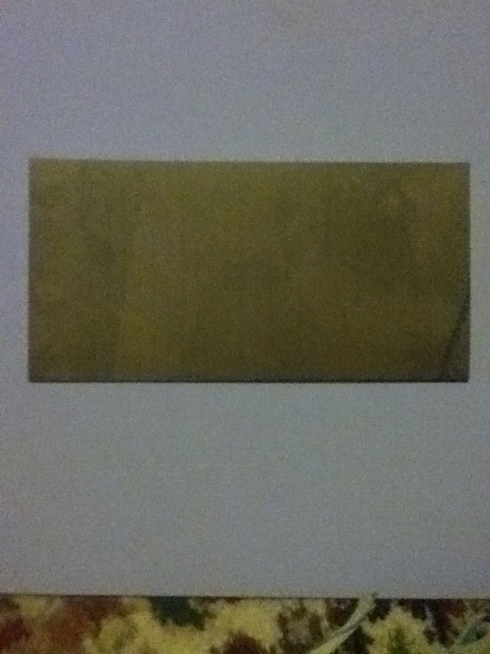 And turn to the white side, then fold in half