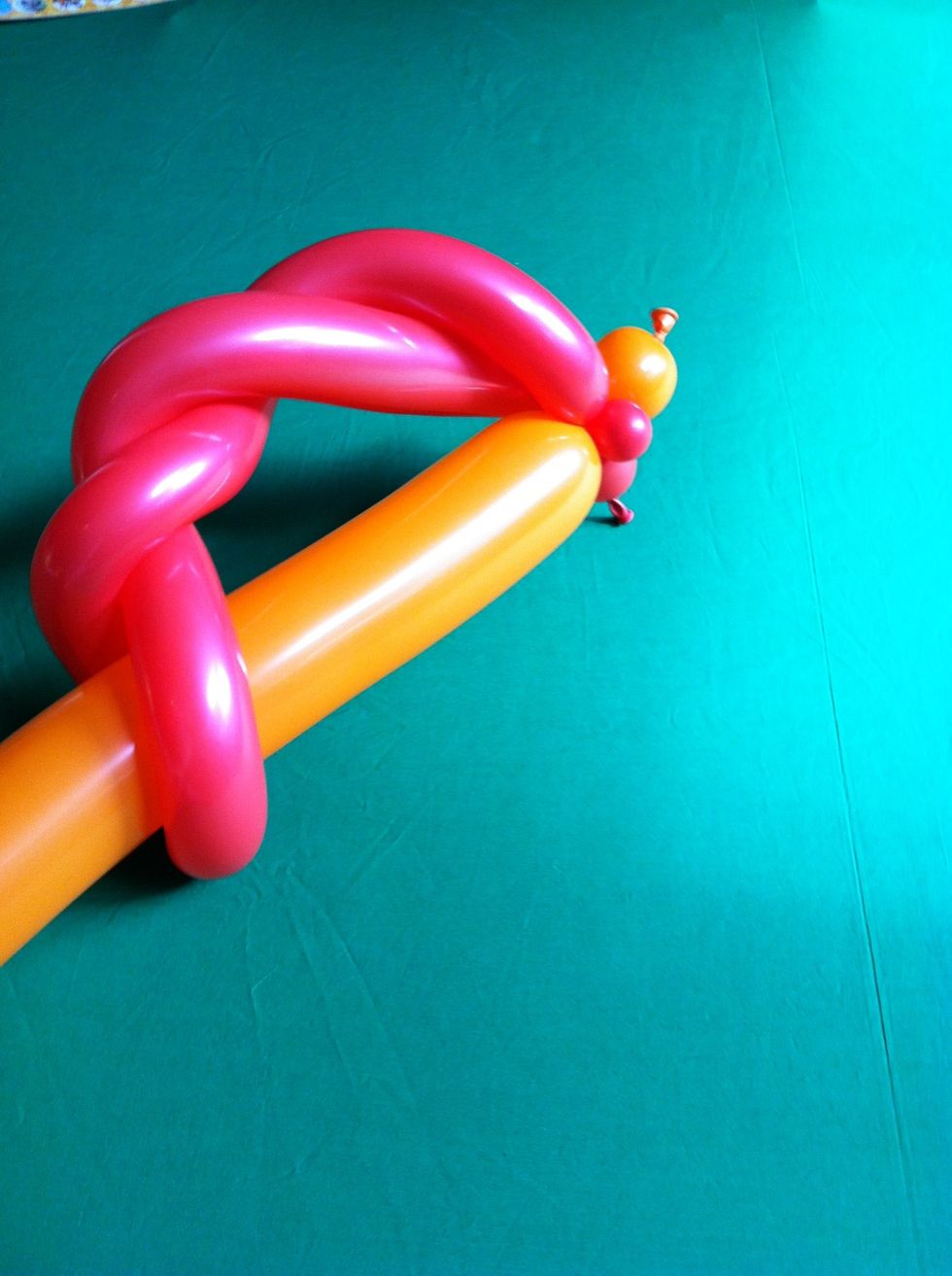 And twist off a bubble at the top to attach to the bubbles at the top of the spiral