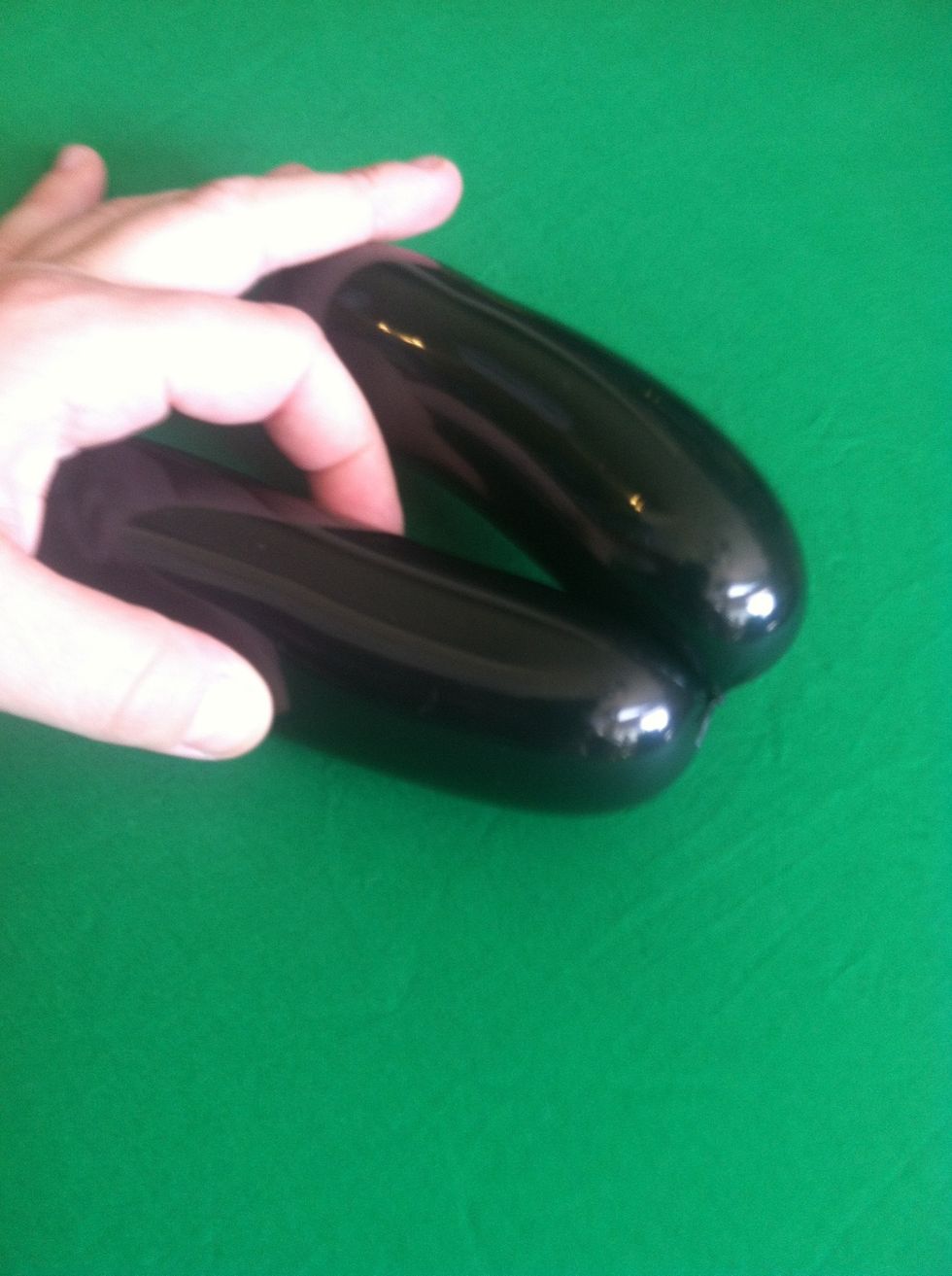 And twist one side at the center to make a joint between them (hint keep hold of both sides until it is attached to the rest of the piece)