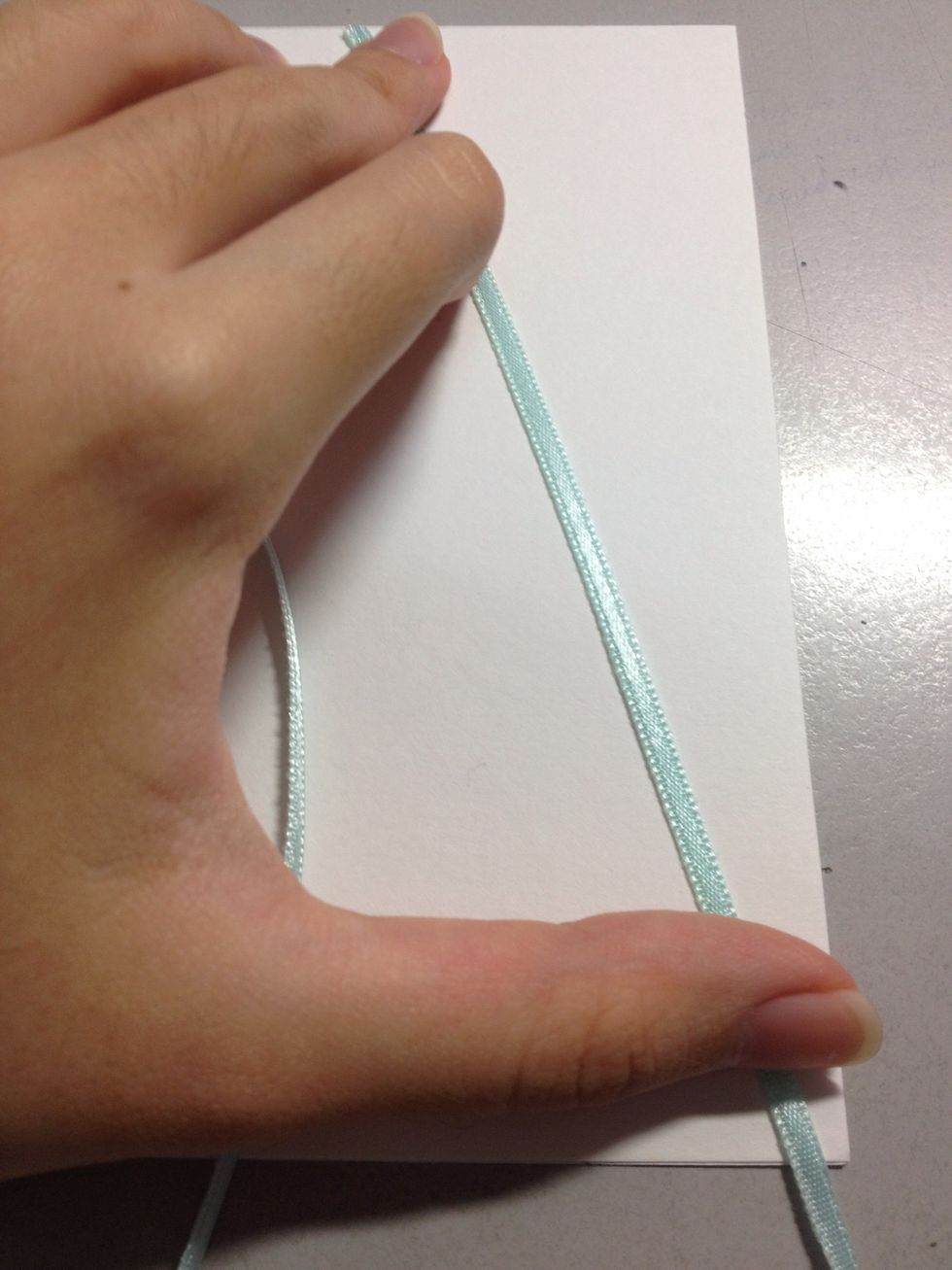 And two last ribbons covering the edge of the card diagonally.