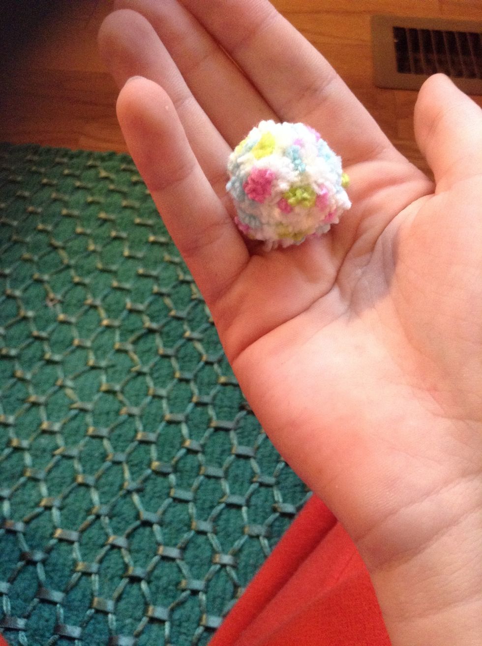 And ur done enjoy ur super cute pom pom!