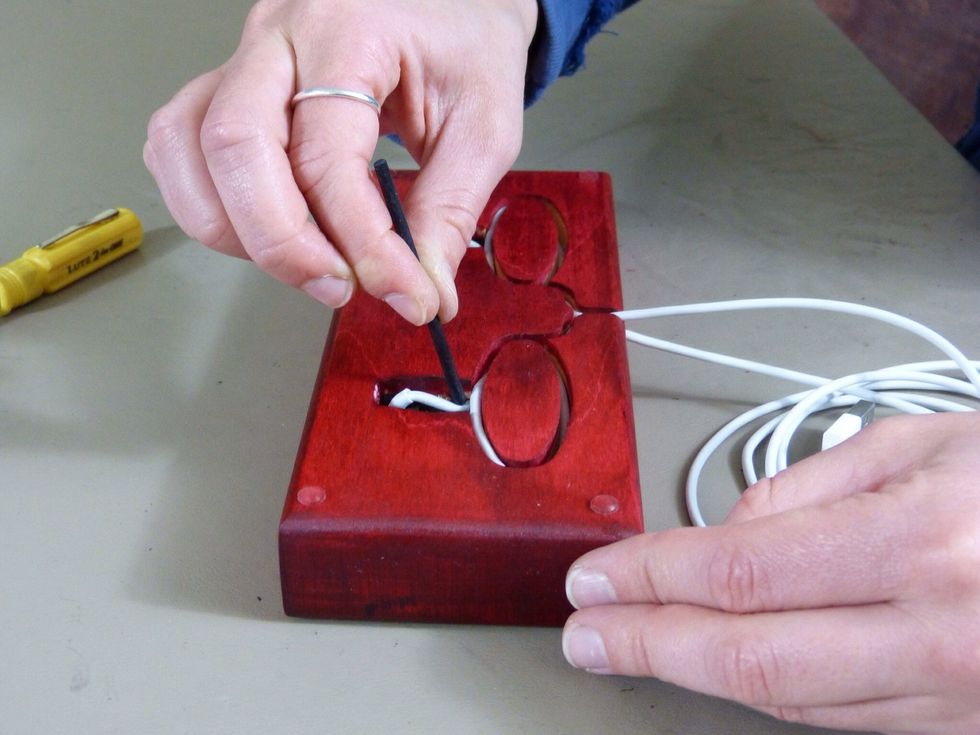 And use it to push the cables as deep into the slot as possible