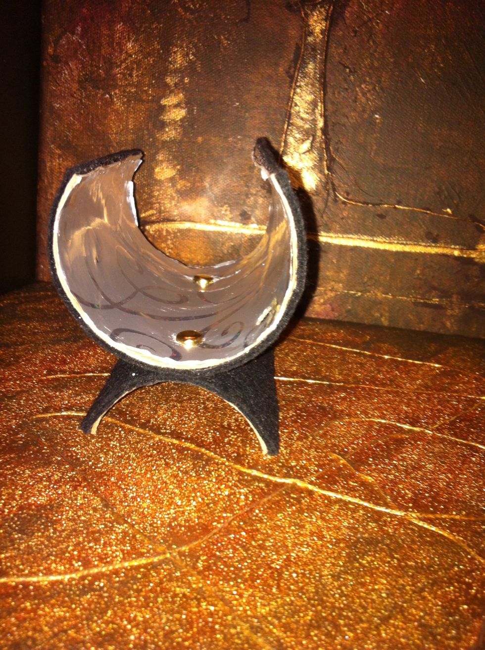 And voila it's now ready to be stuffed. Side note: I used black felt on the outside part and a silver gift wrap for the inside part. I call this piece the tuxedo.