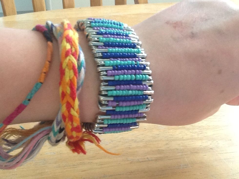 And voila, you have a wonderful and beautiful bracelet made from safety pins! Thanks for viewing! Bye!