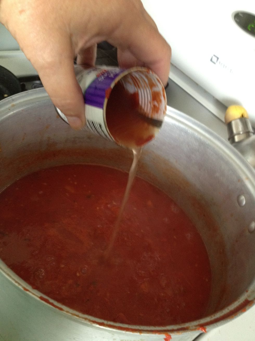 And water - 2-3 cans of water per can of tomato paste.