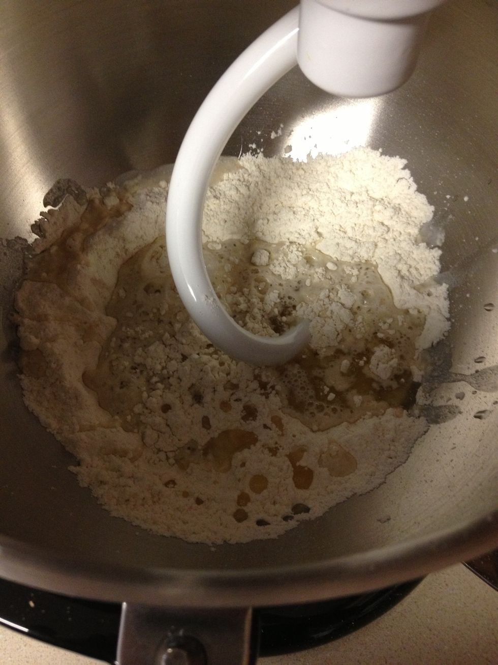 And water and oil to mixer and mix until fully combined