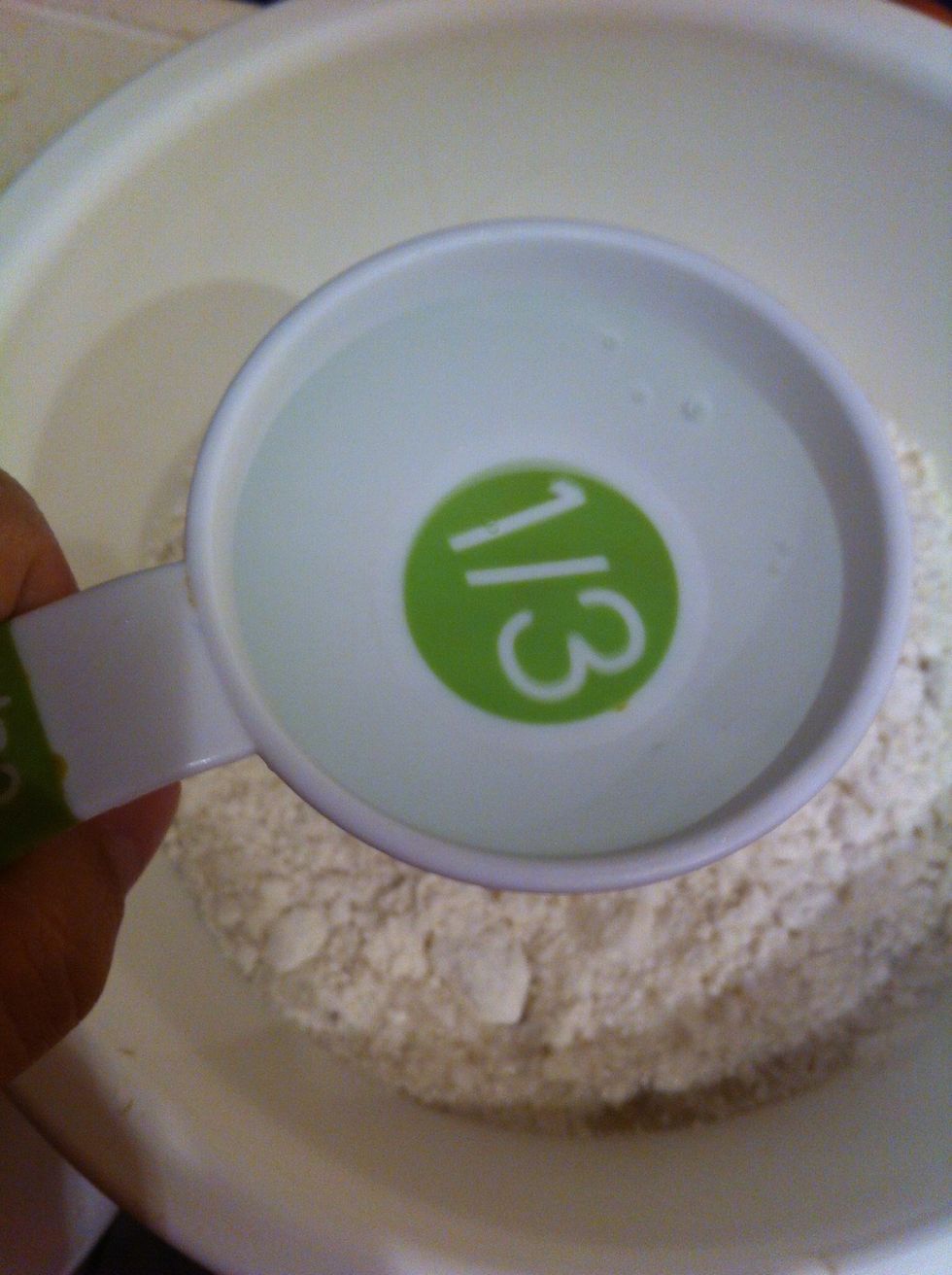And water into a 1/3 cup into bowl