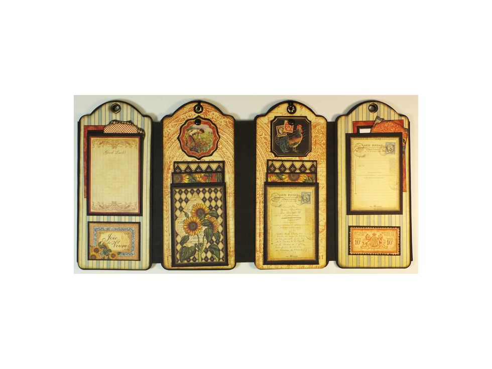 ... and we start seeing the tags on the inside in the center. Then we'll open up the two end tags one more time...