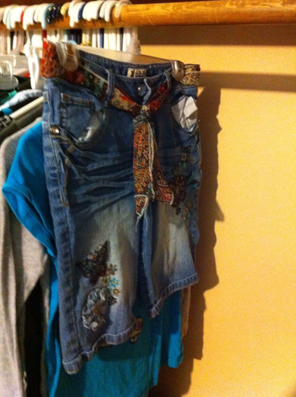 And what's next to that? A pair of shorts. Also out of season. Take those out.