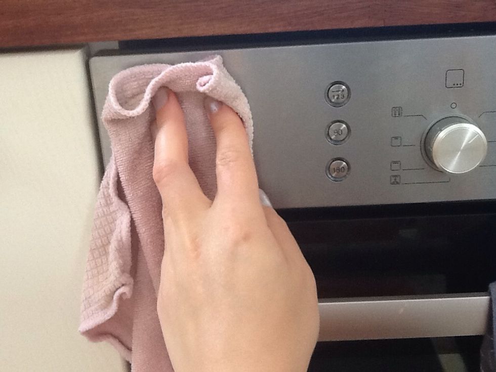 And wipe your stainless steel with it. You can later polish it with dry end of your cloth