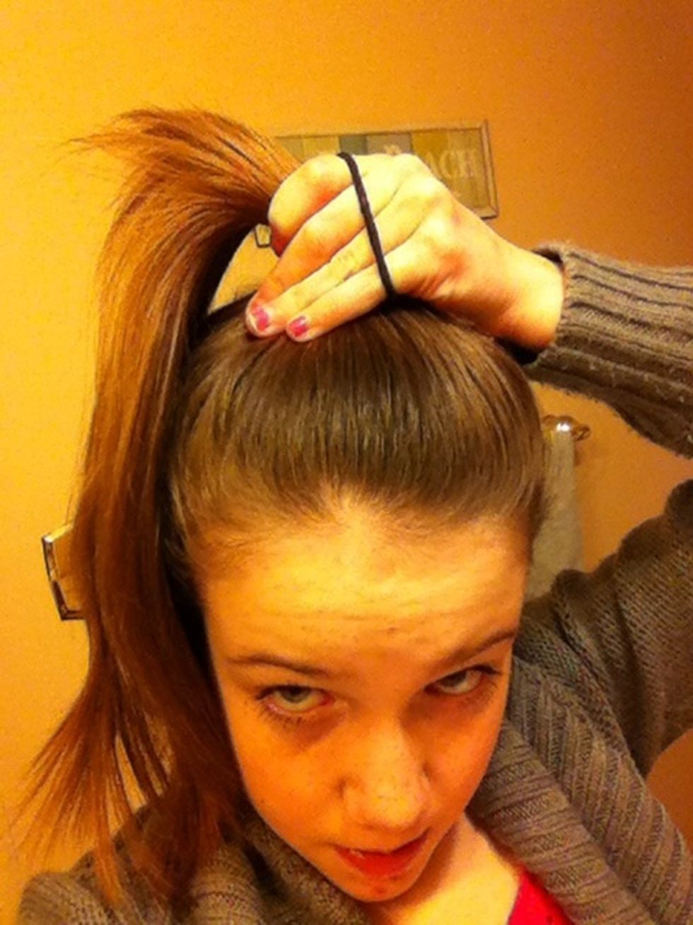 And wrap the hair tie around your ponytail