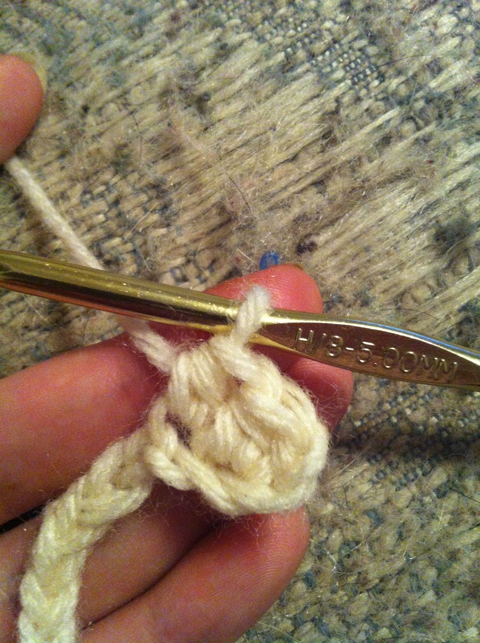 and you get your second half double crochet :) now keep going till you reach the end of the row.