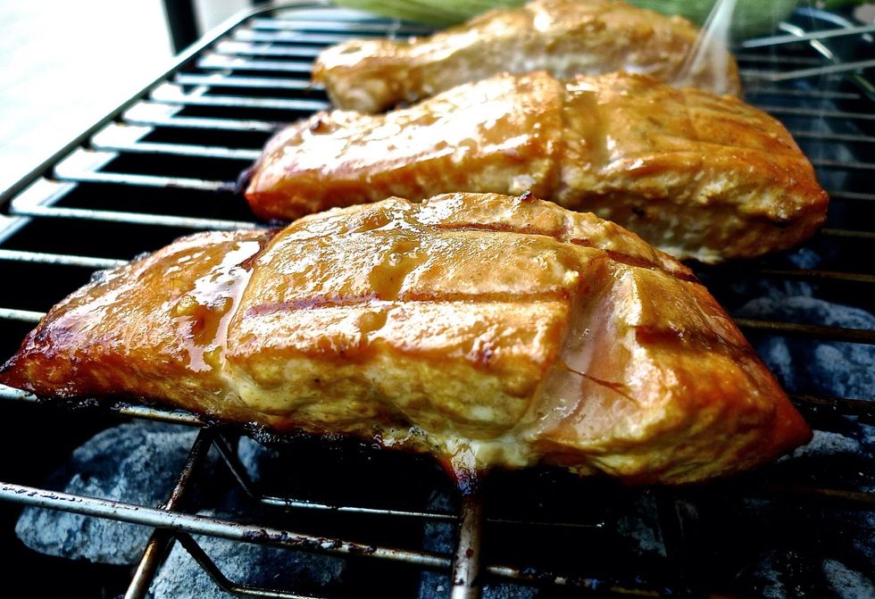 And you're done! Check the flesh at the thickest part of the fillet. When it's done, grilled salmon will be opaque, flaky yet moist and will pull apart easily.