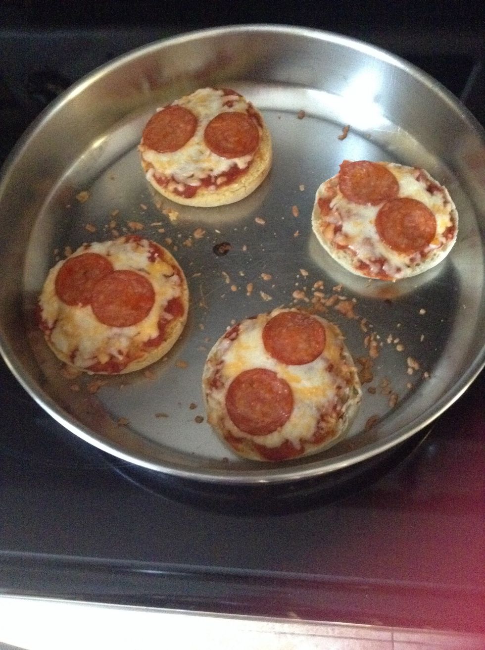 And you're done! Enjoy your delicious mini pizzas!  Resources: allrecipes.com