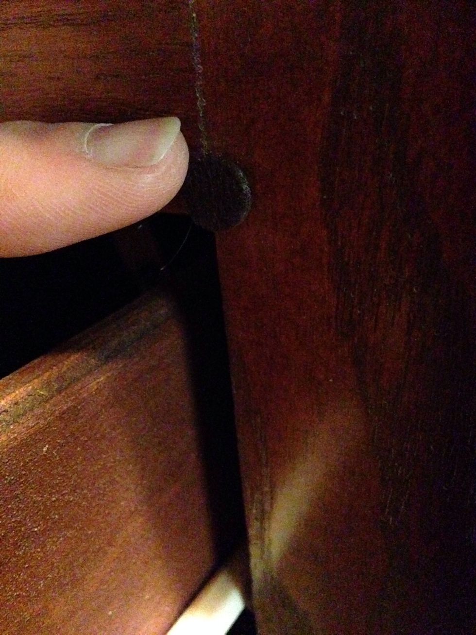 Another felt pad, placed opposite the ones you put on the "inside" of the drawer front, will bring it virtually down to a whisper.