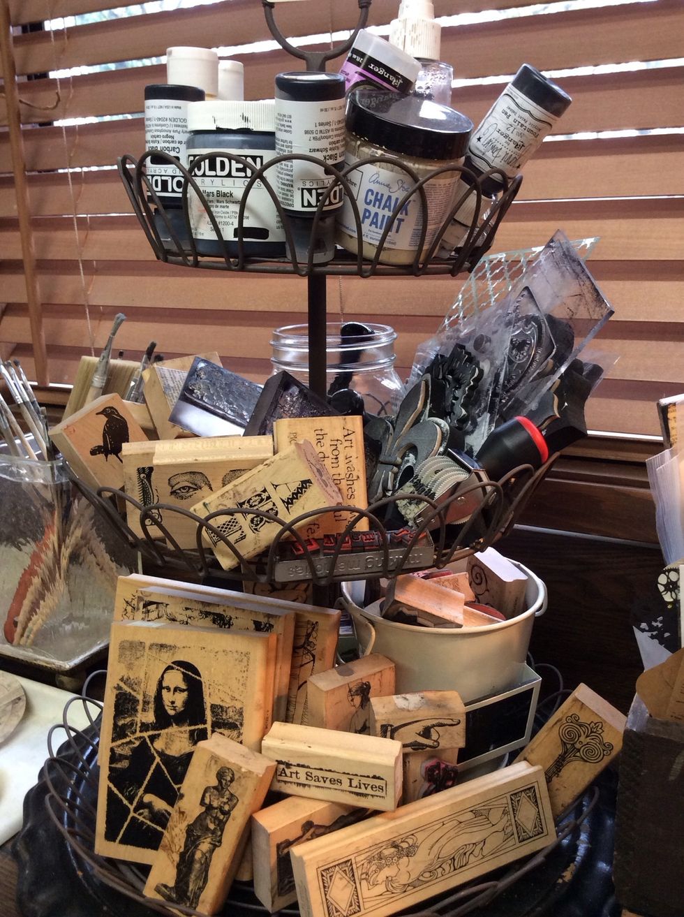 Another go-to fav...metal tiered baskets. This one houses my most used stamps and paints.