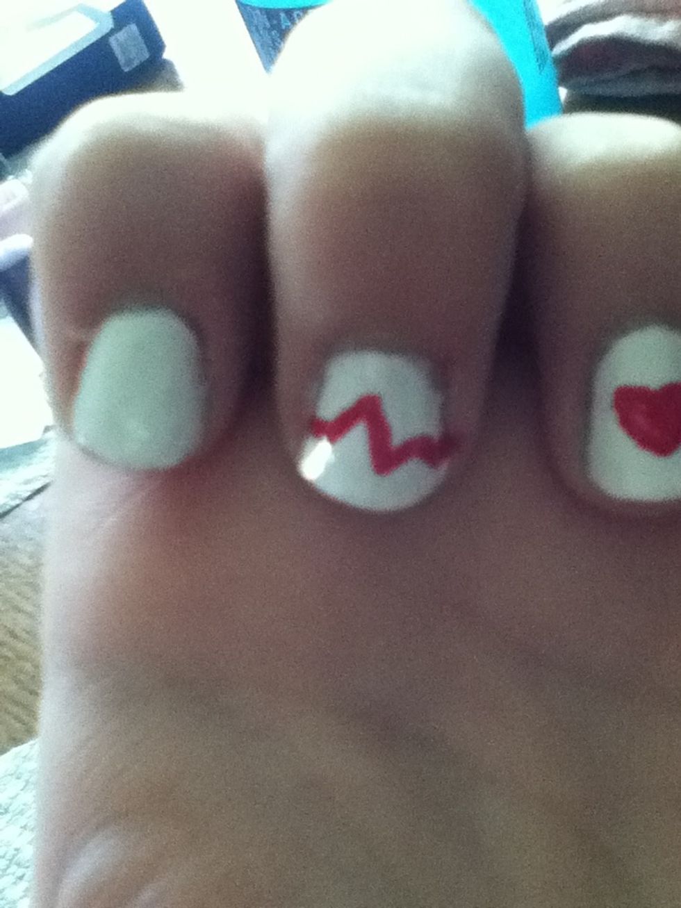 Another heart beat line on middle finger