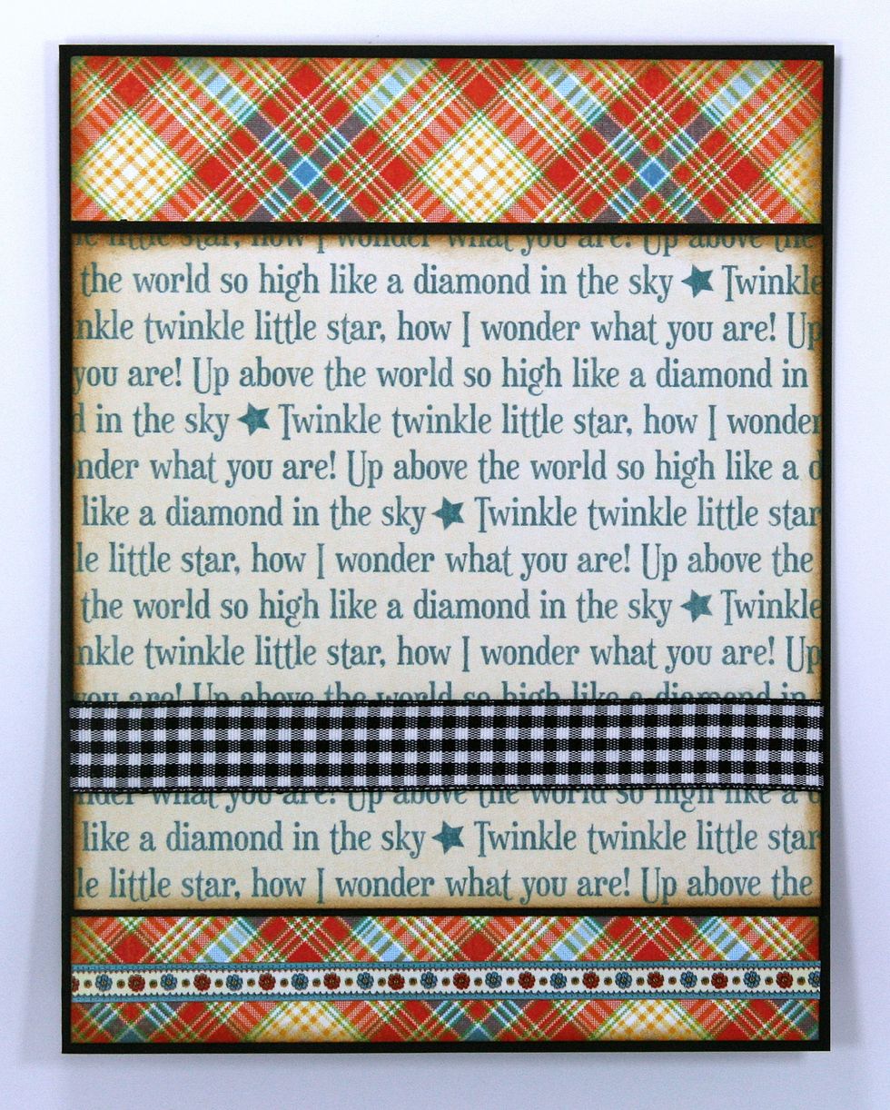 Another layer of patterned paper....separated with more black cardstock. I've wrapped the ribbon around and hid the ends between the layers for a nice finished look.