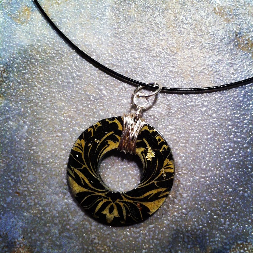 Another option is to use pliers to wrap the washer with silver wire, create a round opening at the top then add the finished pendant to a necklace. I added a jump ring which is optional.