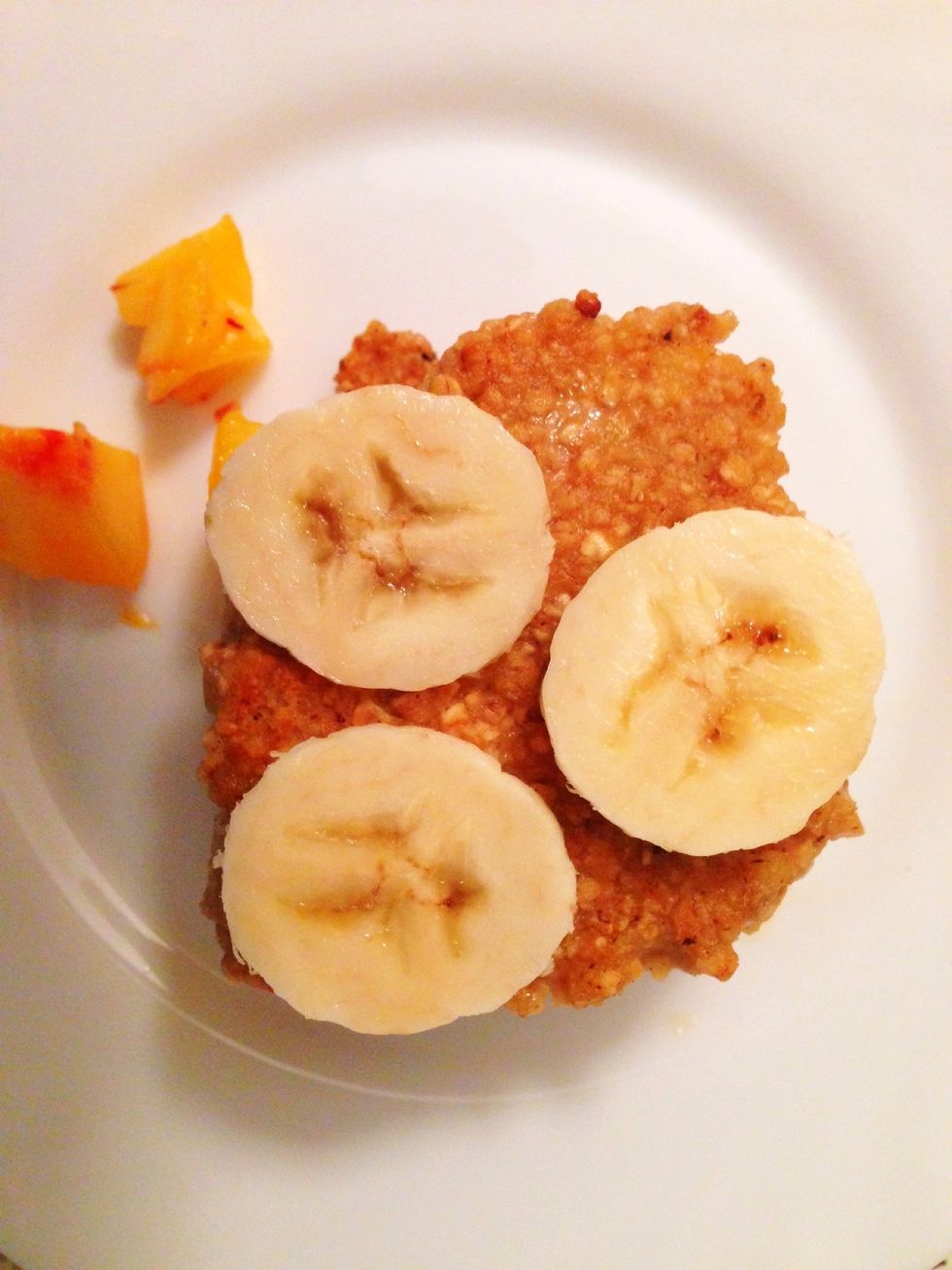 Another pancake with banana on top.