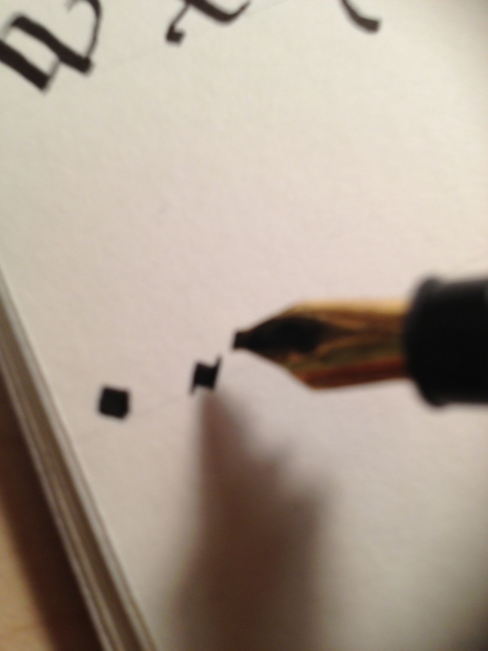 Another style involves adding subdued flourishes (essentially straight lines) to either end, running horizontally...