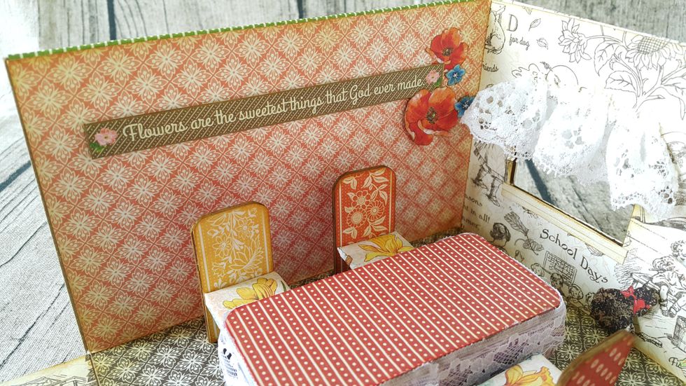 Another wall with sentiments and fussy cut flowers.