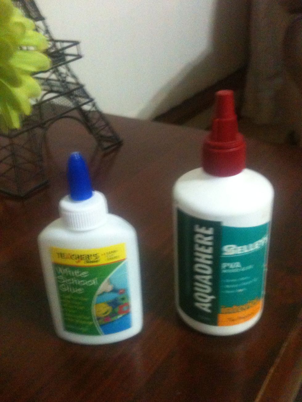 Any glue will do as long as it sticks. ( you could  also use a hot glue gun )