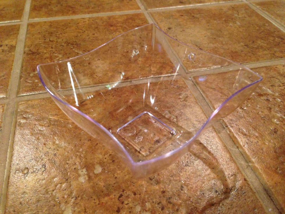 Any shape of container can work.  This is a small artsy bowl and has a lot of openness for the plant to get air.