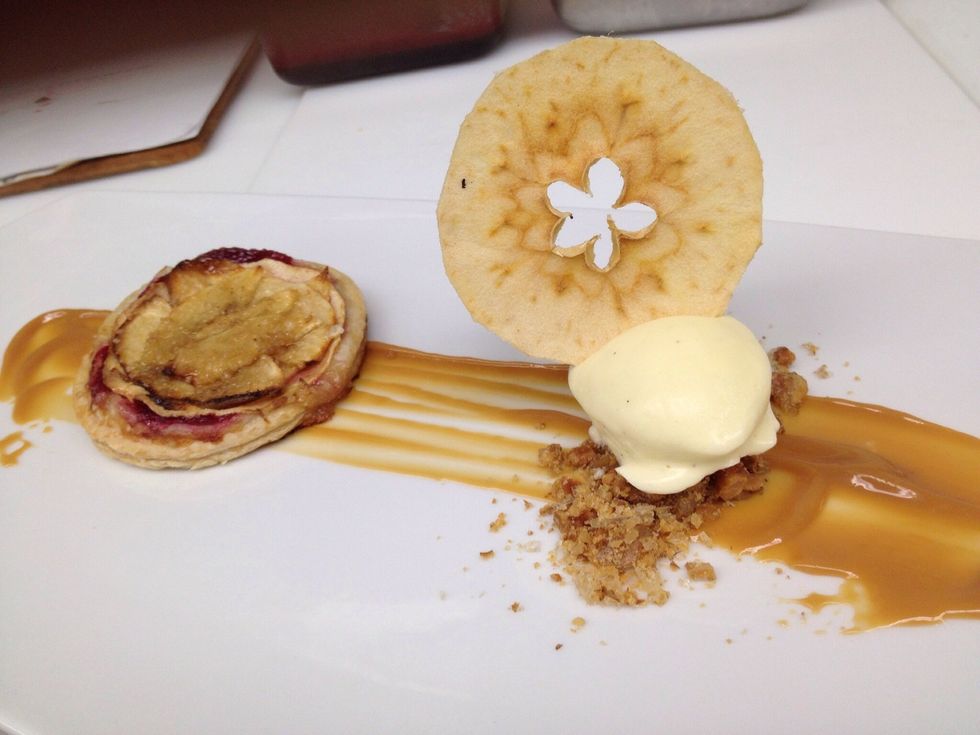 Apple chip garnish. Tip: before dehydrating, dip apple slices in simple syrup.