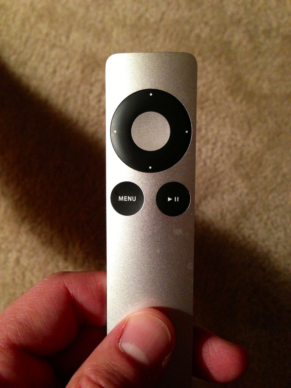 Apple TV controller. To use push HDMI 3 on remote from step 1. Also has netflix. Just touch any button to turn it on. Very few buttons and all self explanatory.