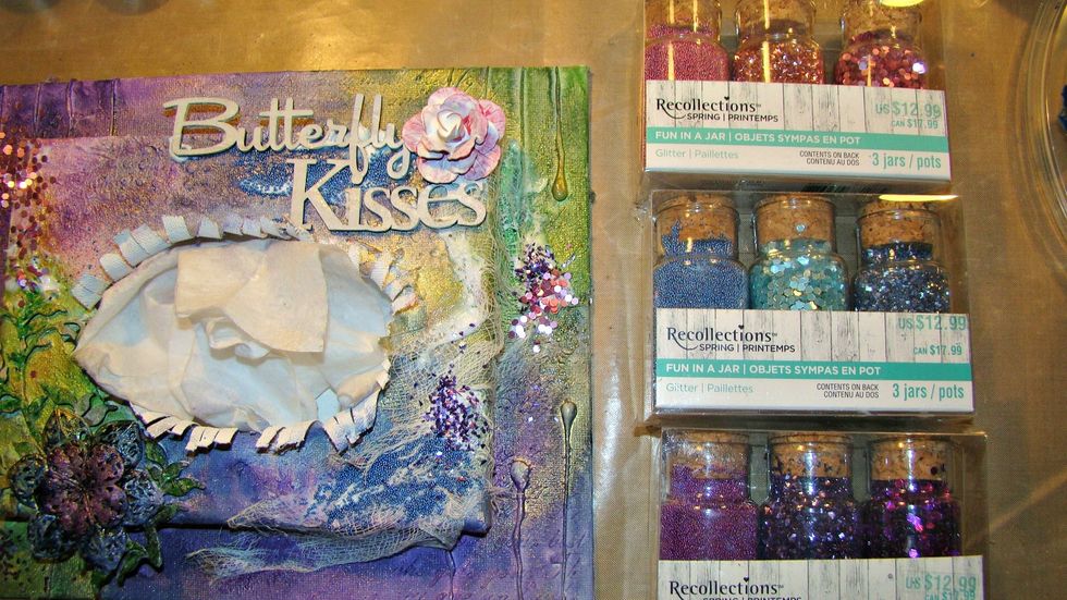 Applied some cheese cloth for pretty texture using 3D gloss gel and sprinkled sequins, seed beads and glass glitter in coordinating colors to my canvas.