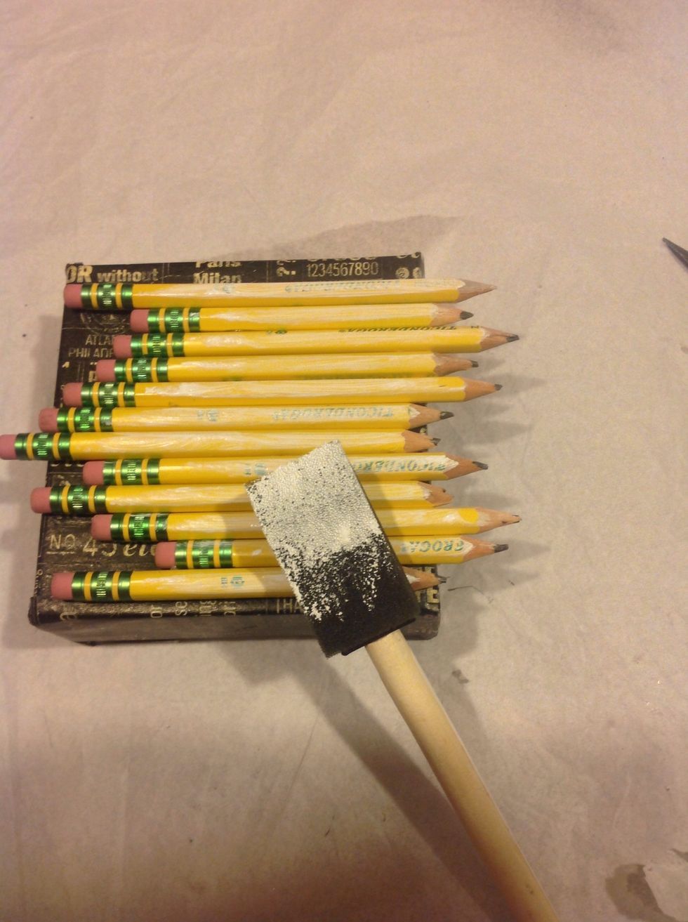 Apply 2 coats of gesso to pencils by brushing the tops of pencils. Don't push down too hard, we only want partial coverage.