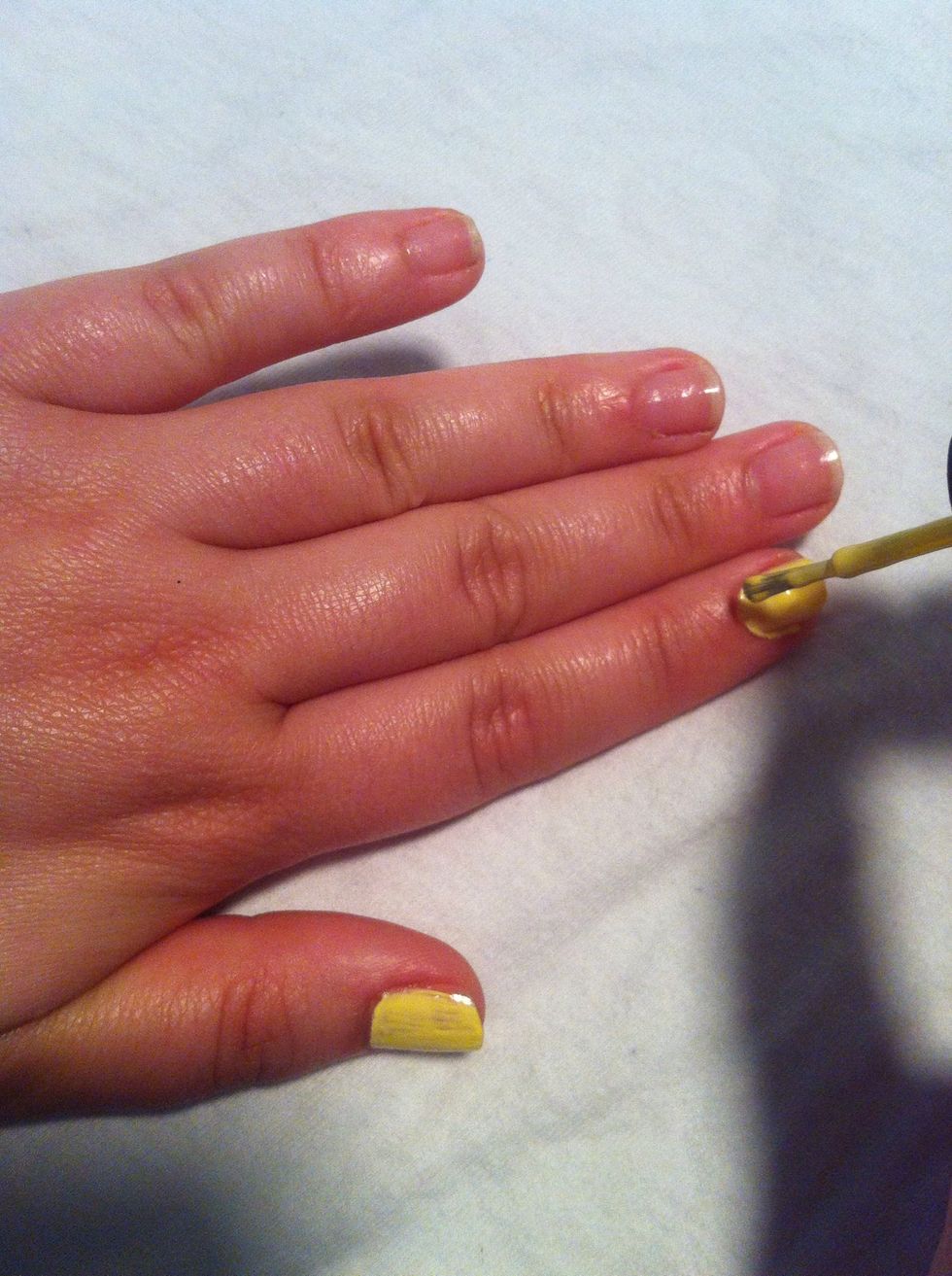 Apply 3 coats of polish, the thickness will help catch the sprinkles. Any color works if it isn't runny. I chose this pale yellow because it reminded me of cake batter--mmm, cake..Ahem..