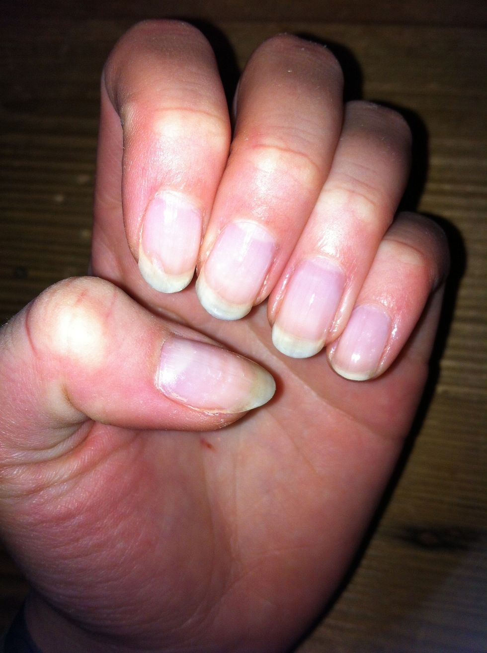 Apply a base coat nail polish to protect your nails.