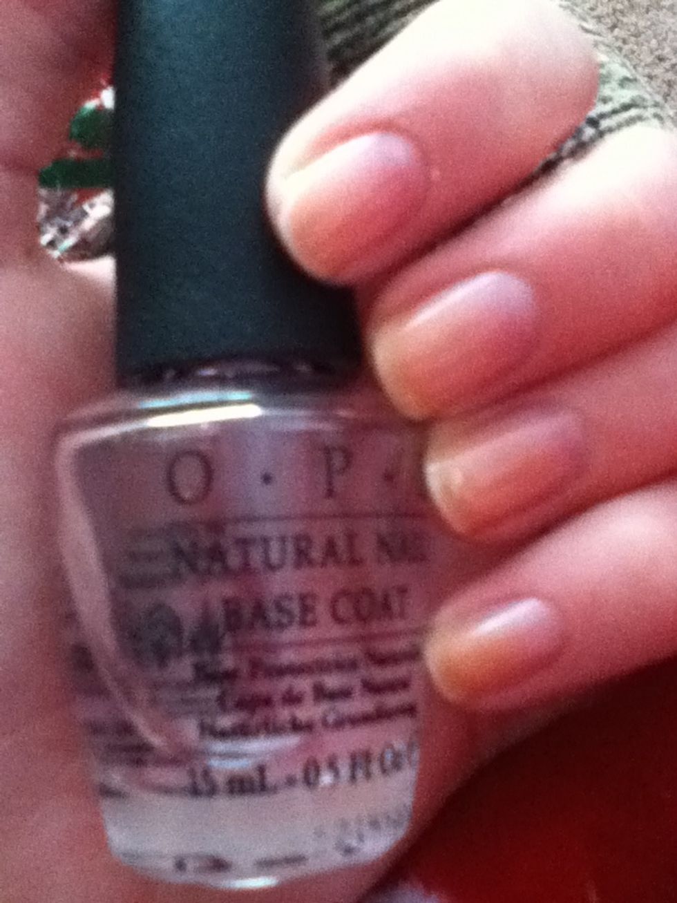 Apply a base coat to protect your natural nails. I use OPI Natural Nail Base Coat. It's about $8 but totally worth it.