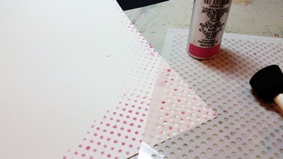 Apply a bit of Barbie Colorations spray though a stencil around the outer edges of the layout.