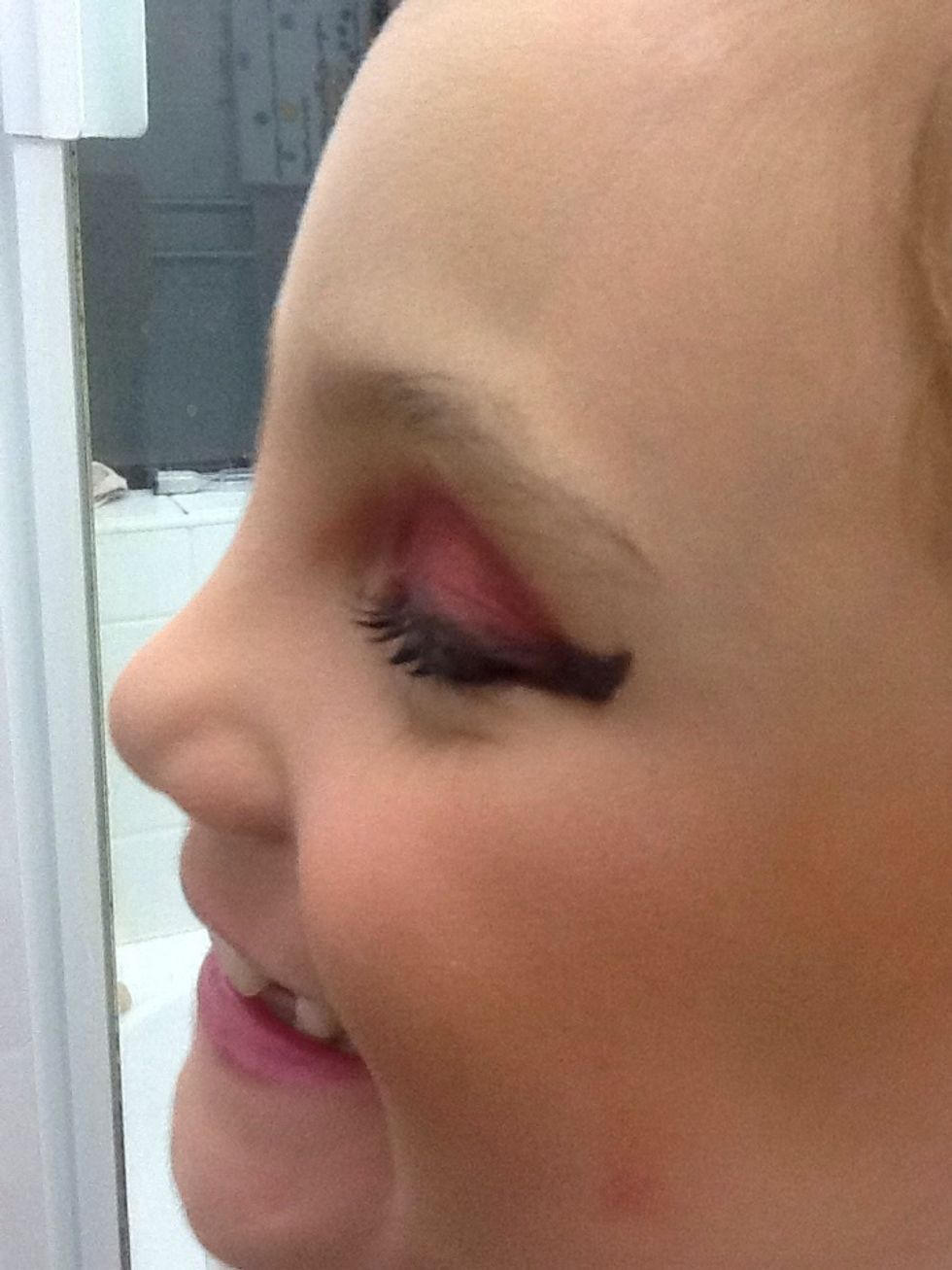 Apply a bright coral/pink mix of colours