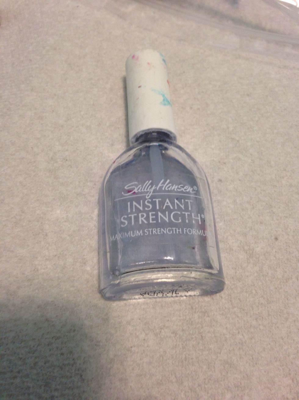 Apply a coat of clear nail polish.