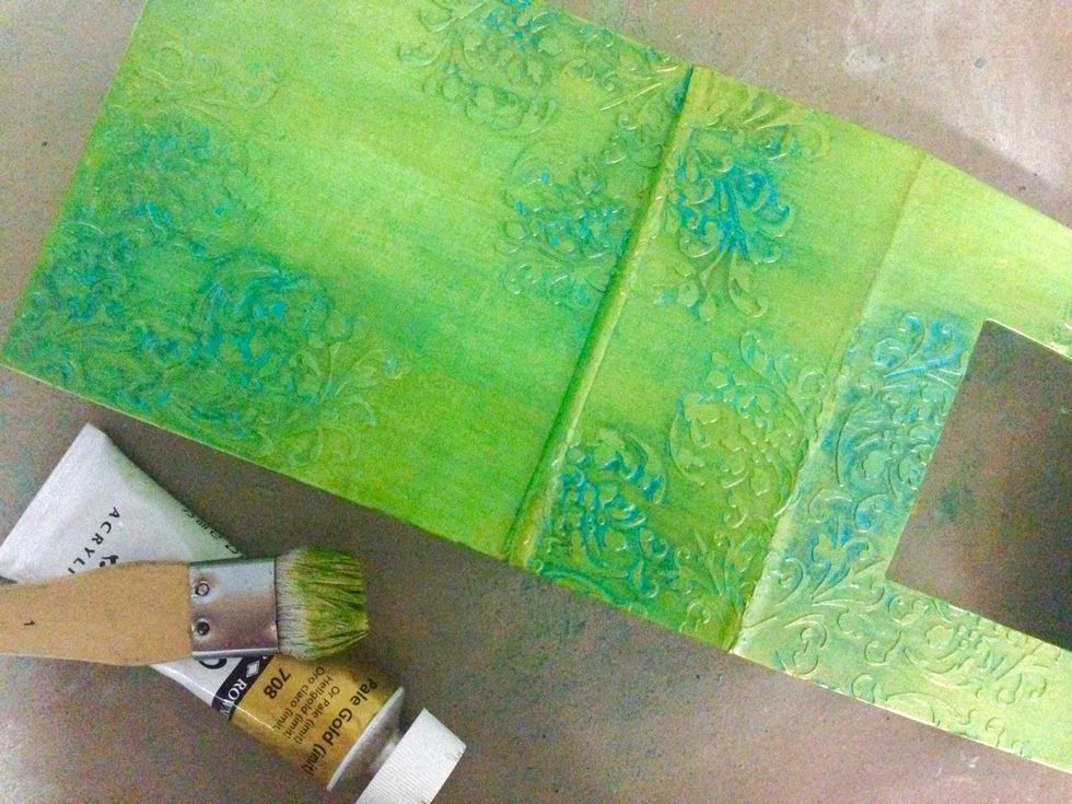 Apply a coat of tinted gold paint over the entire box... DO NOT apply with water as it will wash off the colours you've misted earlier...