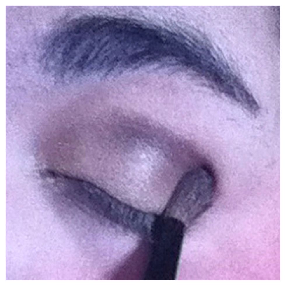 Apply a dark brown shade into your crease.