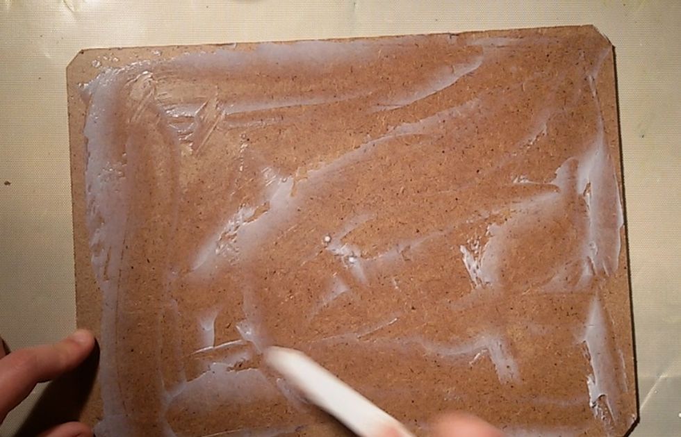 Apply a gel medium or glue on base.