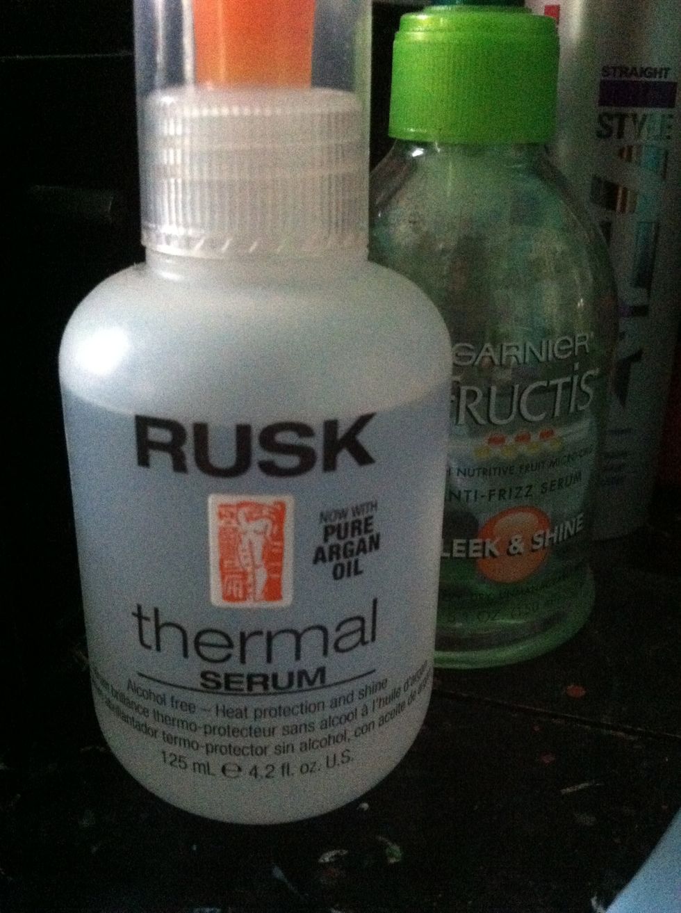 Apply a heat protectant of your choice. You may use either a serum or spray. Apply evenly to hair. Whether or not you use protectant will not effect the straightness of your hair it will just protect.