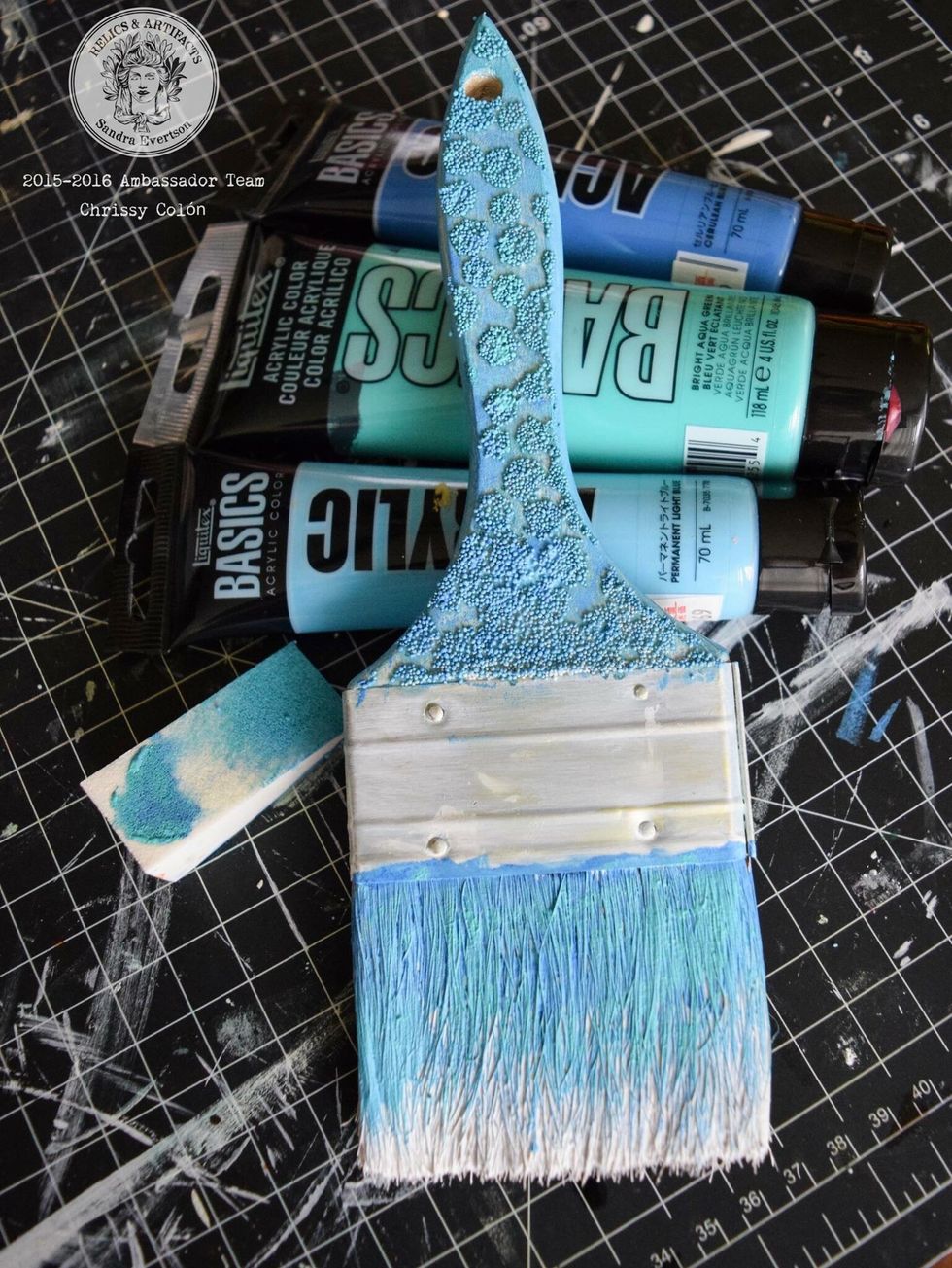 Apply a heavy coat of gesso to the bristles cover completely. Once dry, mix acrylic paints & apply using make up sponge and a dabbing motion. Add highlights and lowlights wherever your heart desires