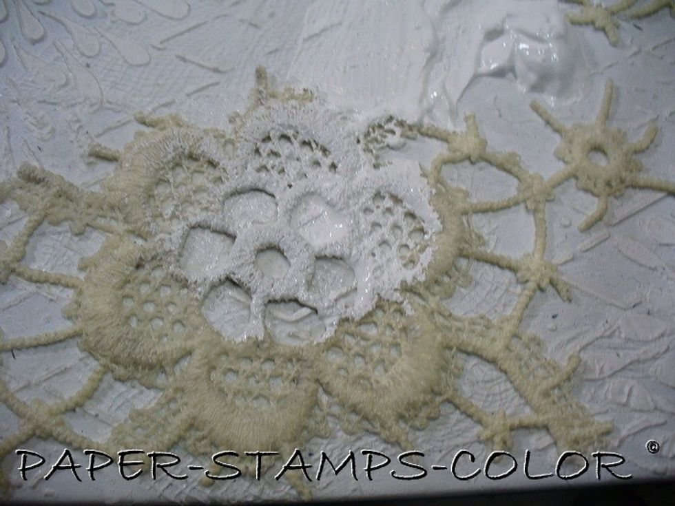 Apply a layer of white gesso over the lace and leave to dry.