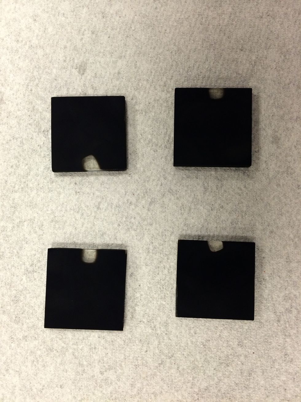 Apply a light even coat over the conductive side of the glass.