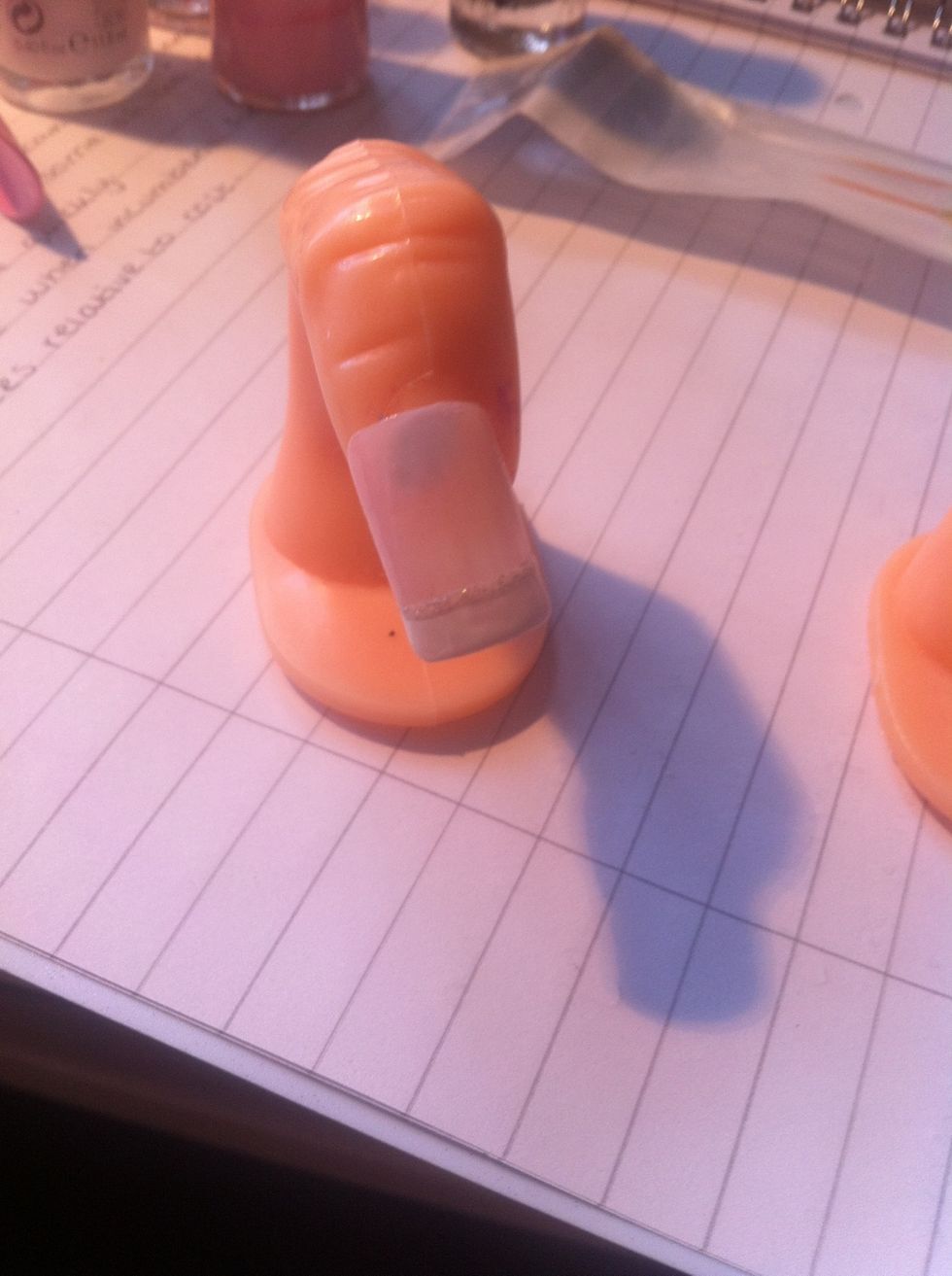 Apply a line of glitter nail polish using the nail art brush...