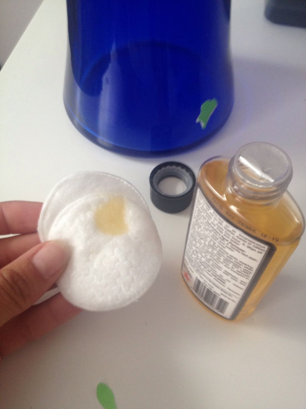 Apply a little Goo Gone to cotton round and blot on sticker