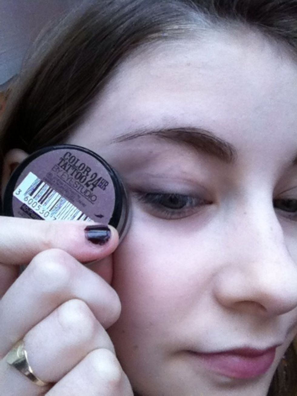 Apply a primer or base to the eye. Im using Maybelline's 24hr colour tattoo eyeshadow in perminant mauve. This will help to keep the eyeshadow in place and make it darker.