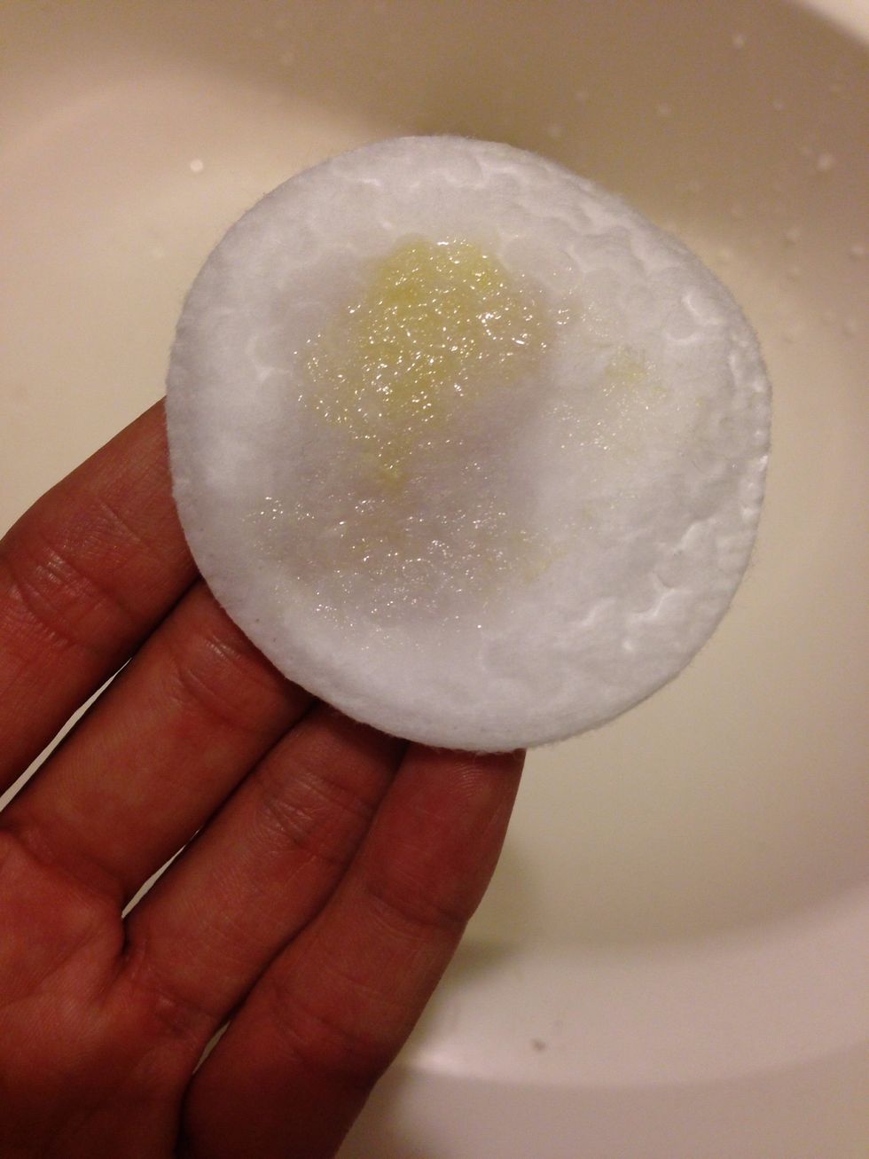 Apply a small amount on a cotton pad.