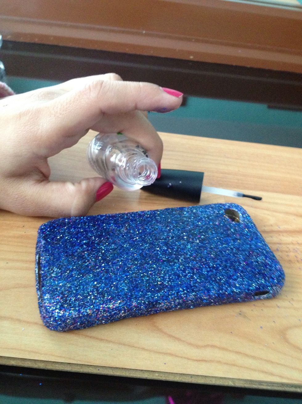 Apply a thin coat of clear nail polish to the entire piece.